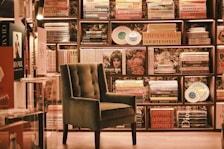 Cozy lounge space with books and soft lighting for relaxation.