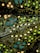 An intricate pattern with abstract floral motifs and circular shapes in neon colors. The design features yellow, turquoise, and white dots on a dark background, creating a visually striking contrast.