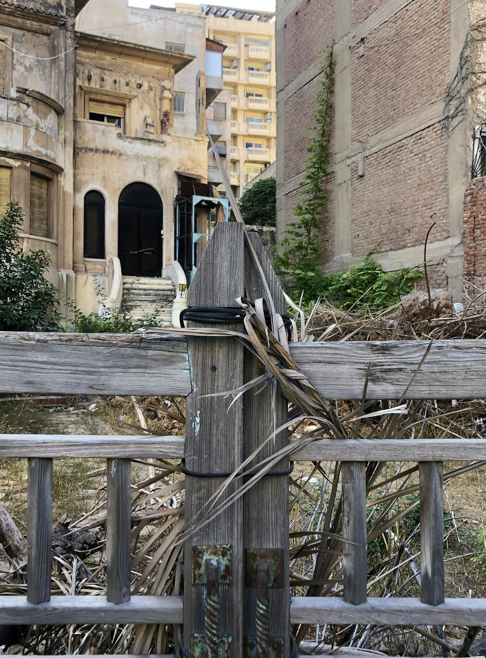 a birdhouse on a fence