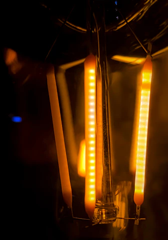 Close-up of LED installation glowing warmly in a modern office.