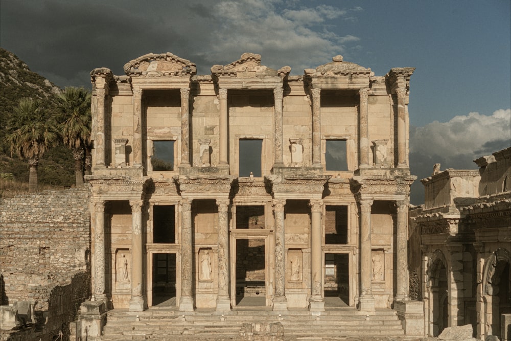 a building with pillars and stairs