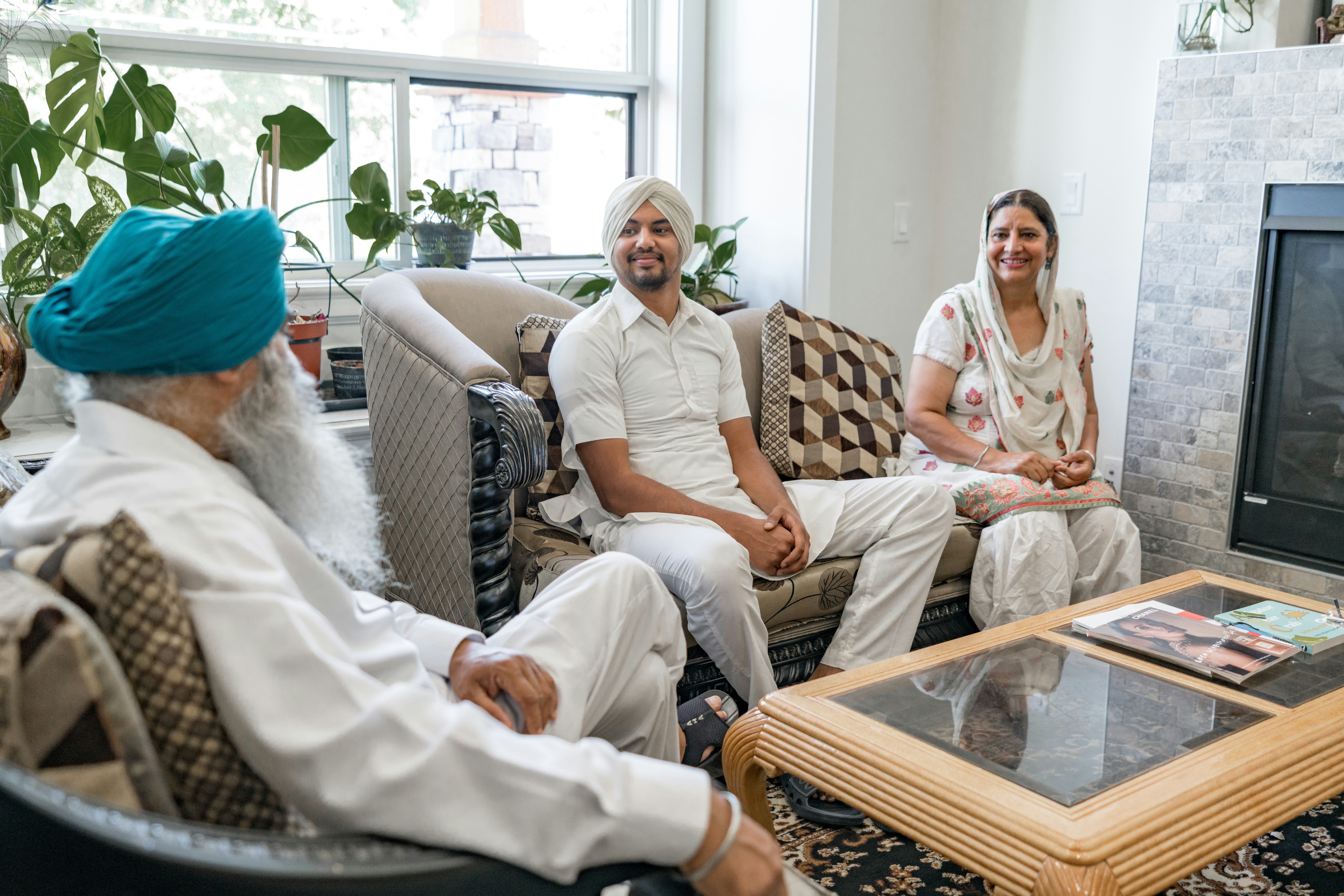 a group of people sitting on a couch