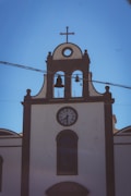 a clock on a bell tower