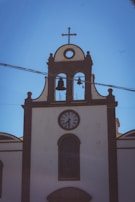 a clock on a bell tower
