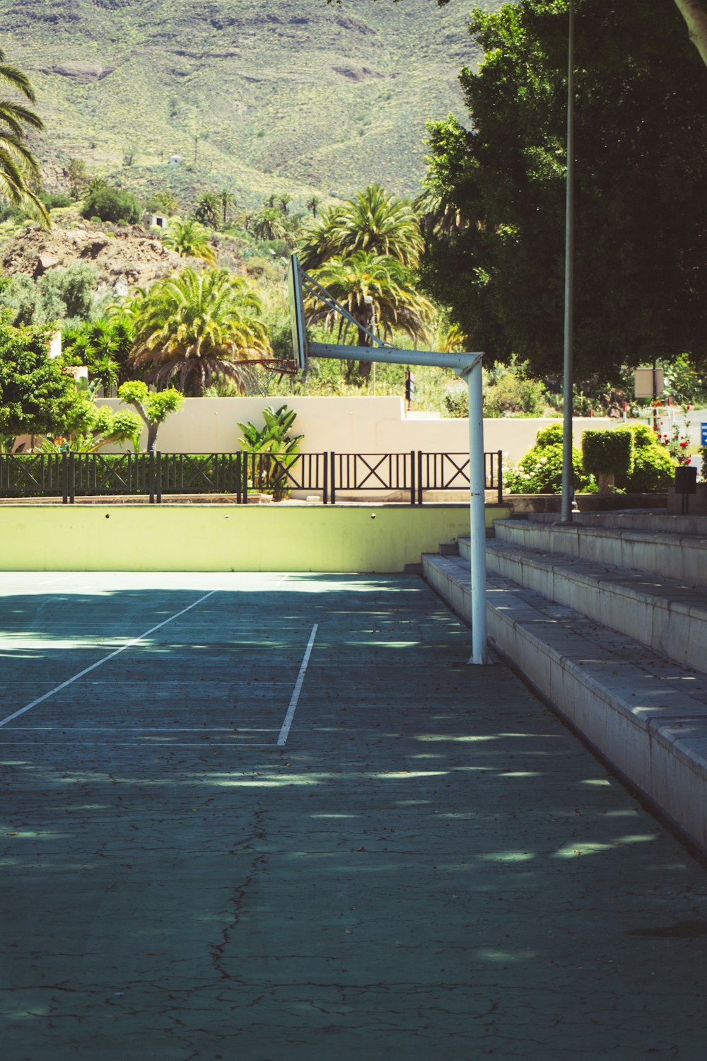 a tennis court with a fence