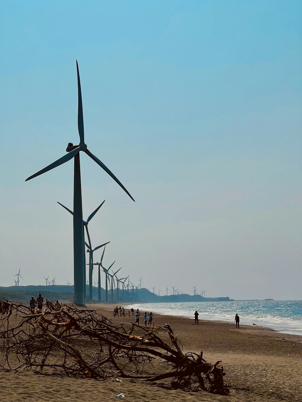 a windmill on a beach