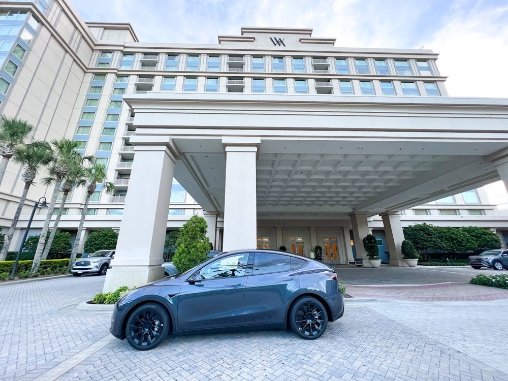 a car parked in front of a building