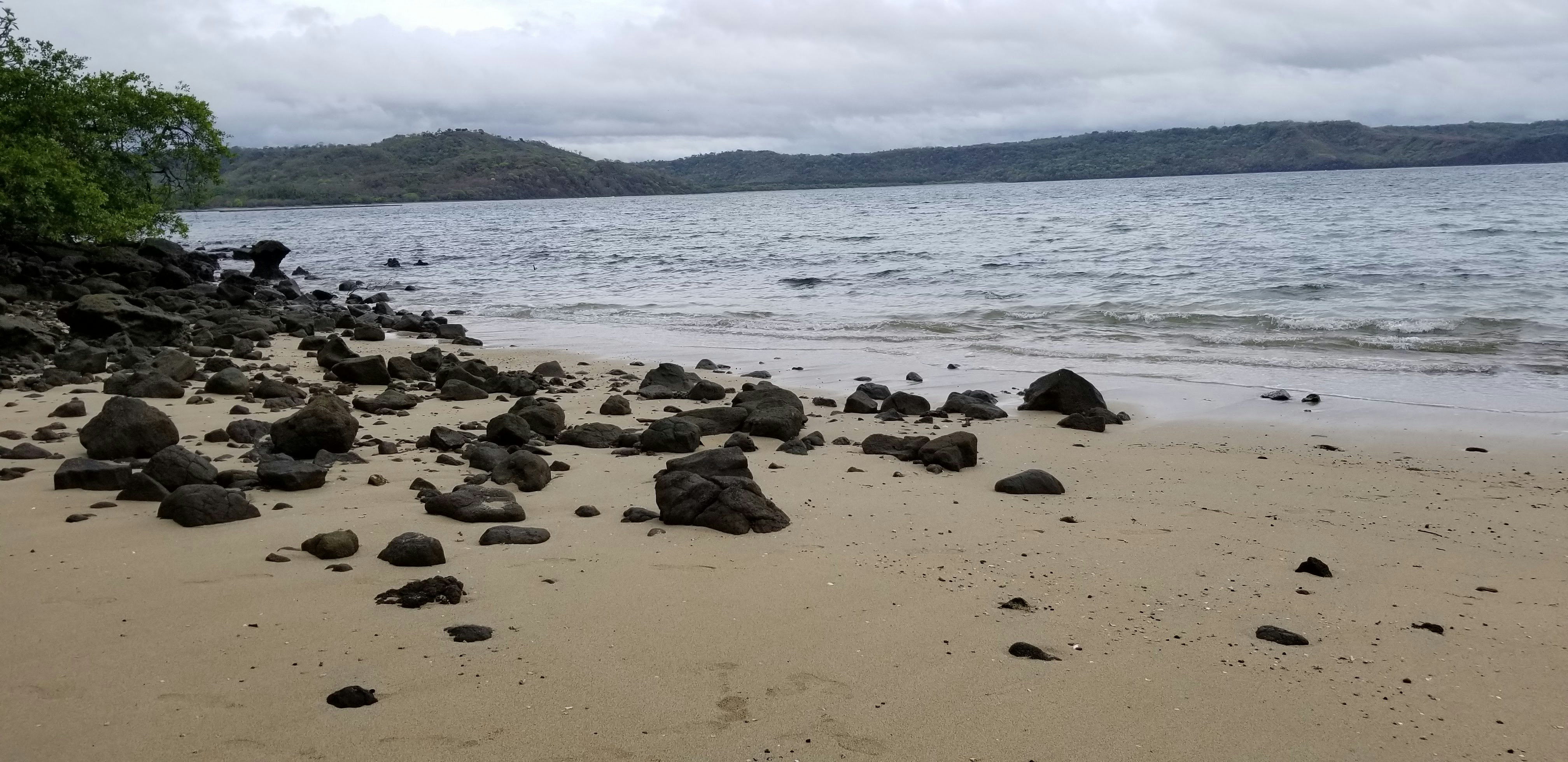a beach with rocks and water