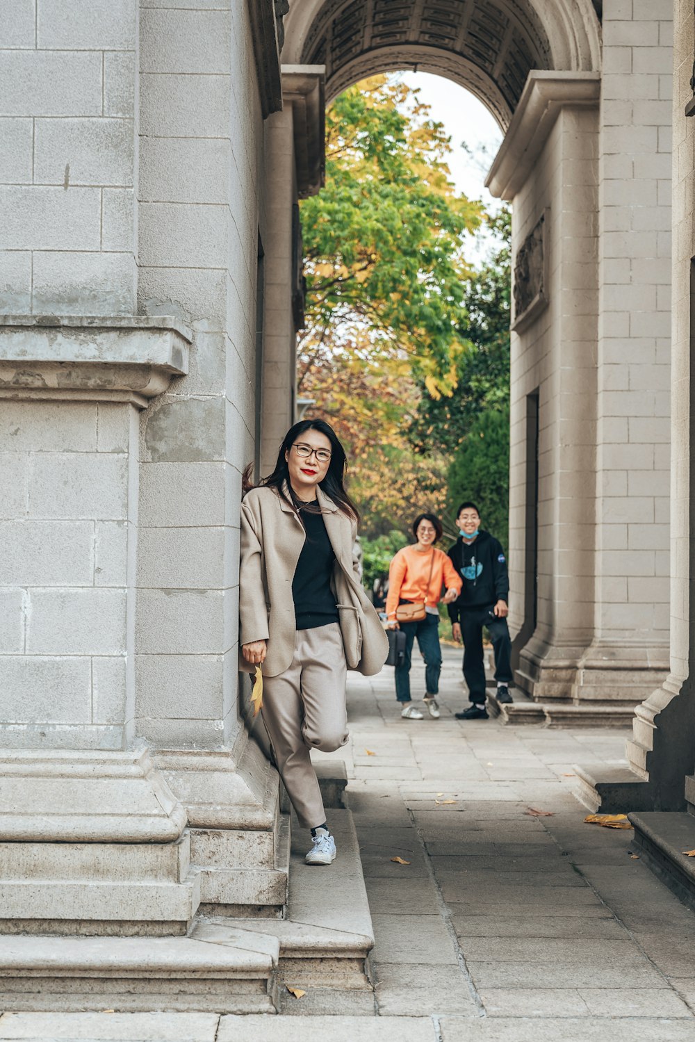 a person standing on a stone walkway