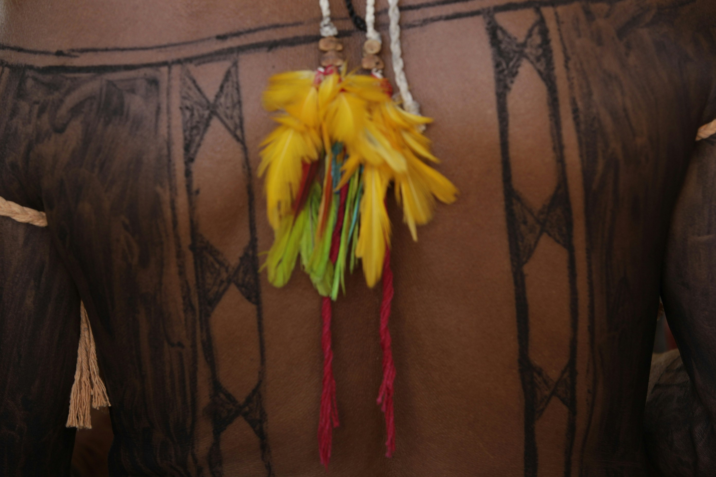 a yellow and red cloth on a string
