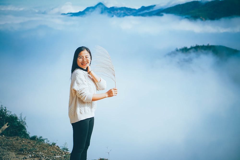 a woman with a white umbrella