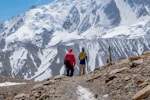 a group of people hiking on a mountain