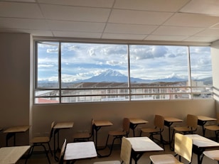 a room with tables and chairs
