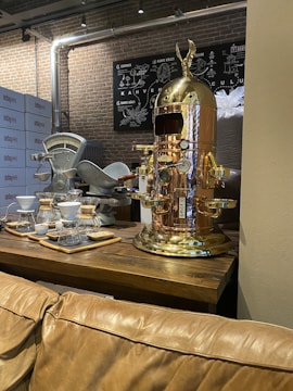 Stylish copper coffee stand placed in a modern kitchen.