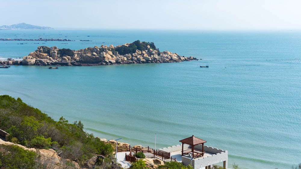 a body of water with a rocky shoreline