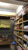 A large cold storage room with various food supplies.