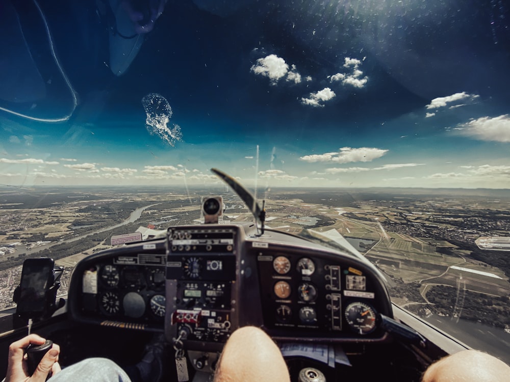 a view of the sky from the cockpit of a plane