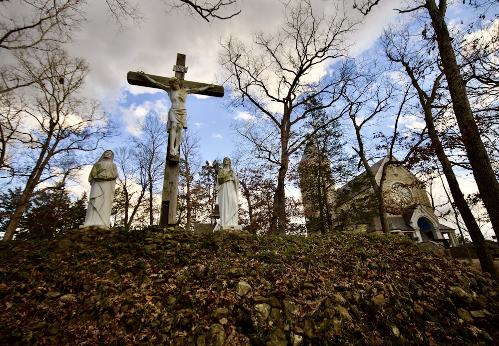 a group of statues in a cemetery