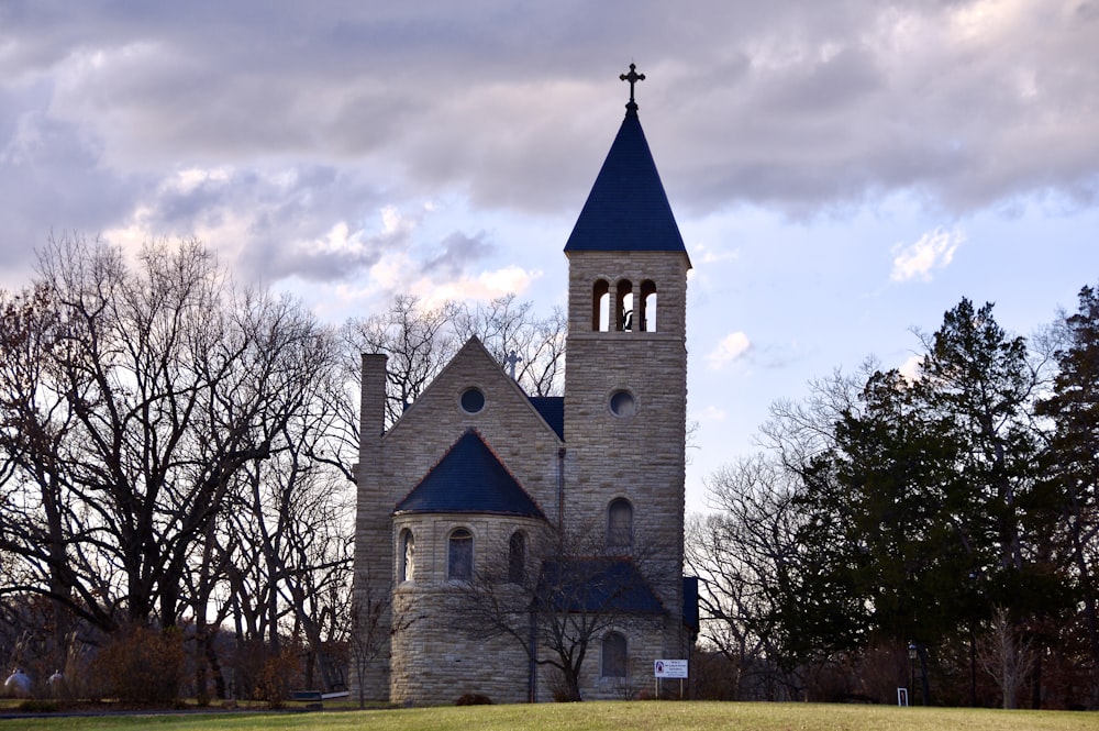 a church with a blue steeple