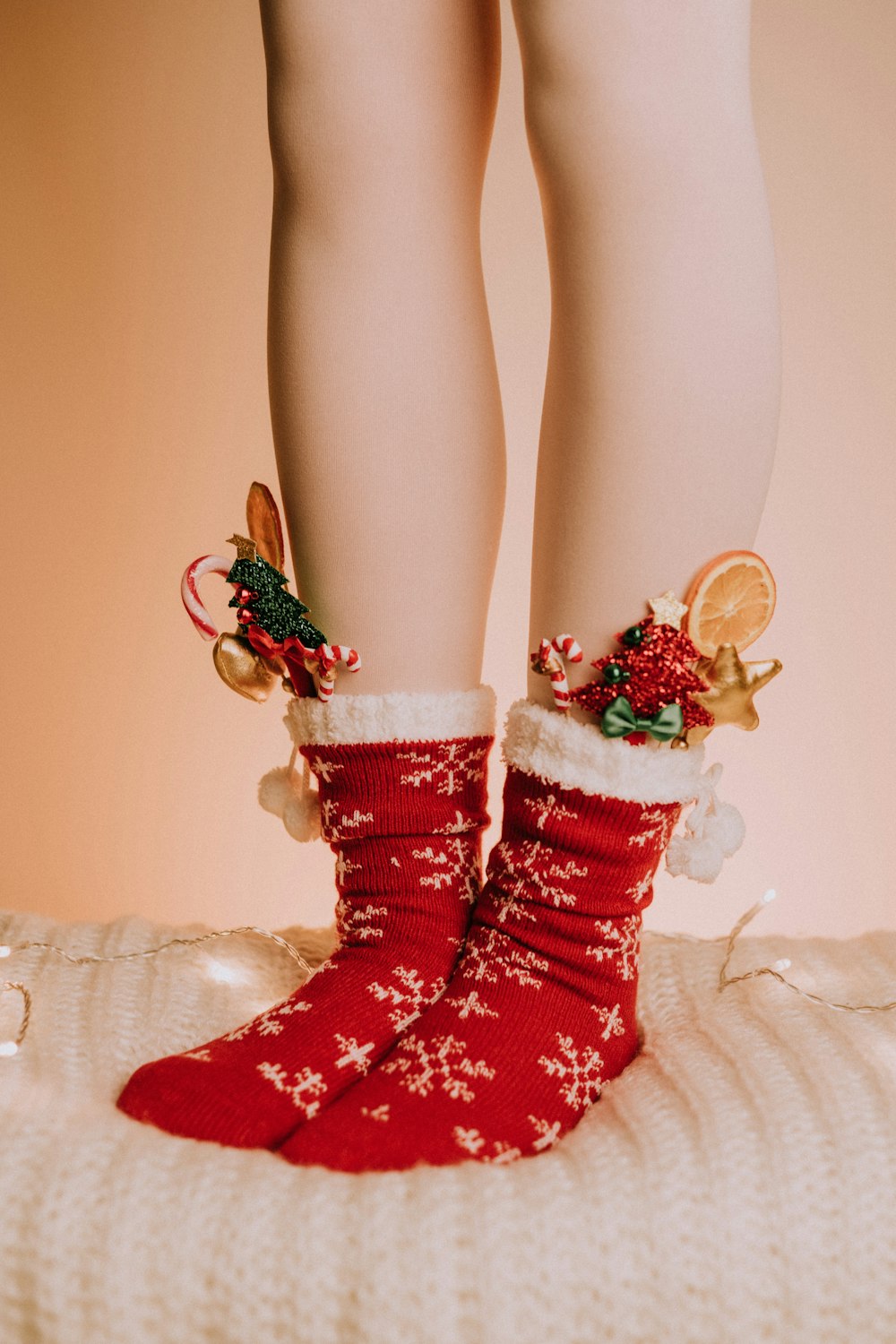 a woman wearing red high heels