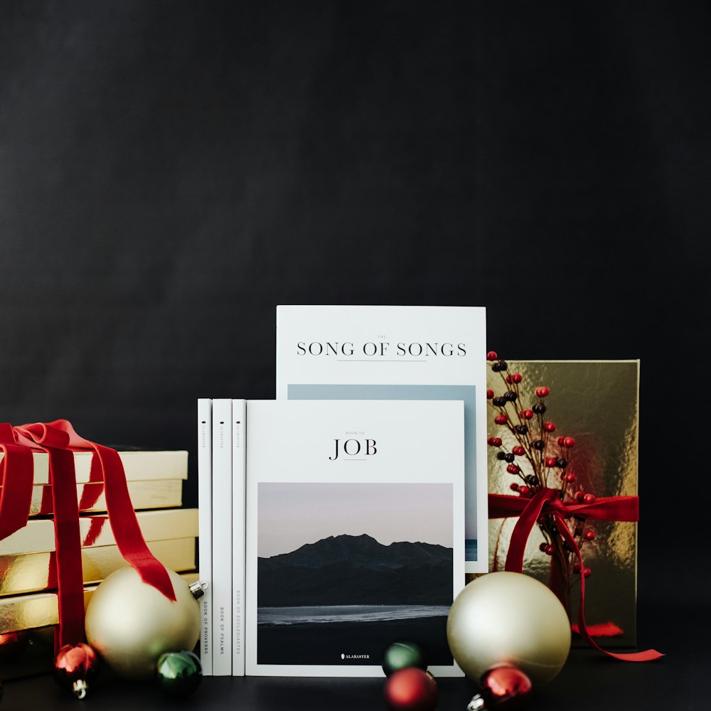 a christmas card with a picture of a christmas tree and a white box