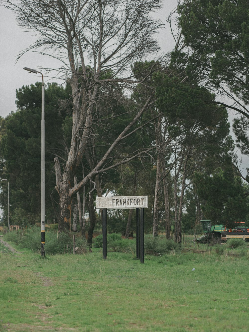 a sign in a park