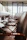Modern office setting with multiple Aero Chairs around a conference table, sunlight streaming in.