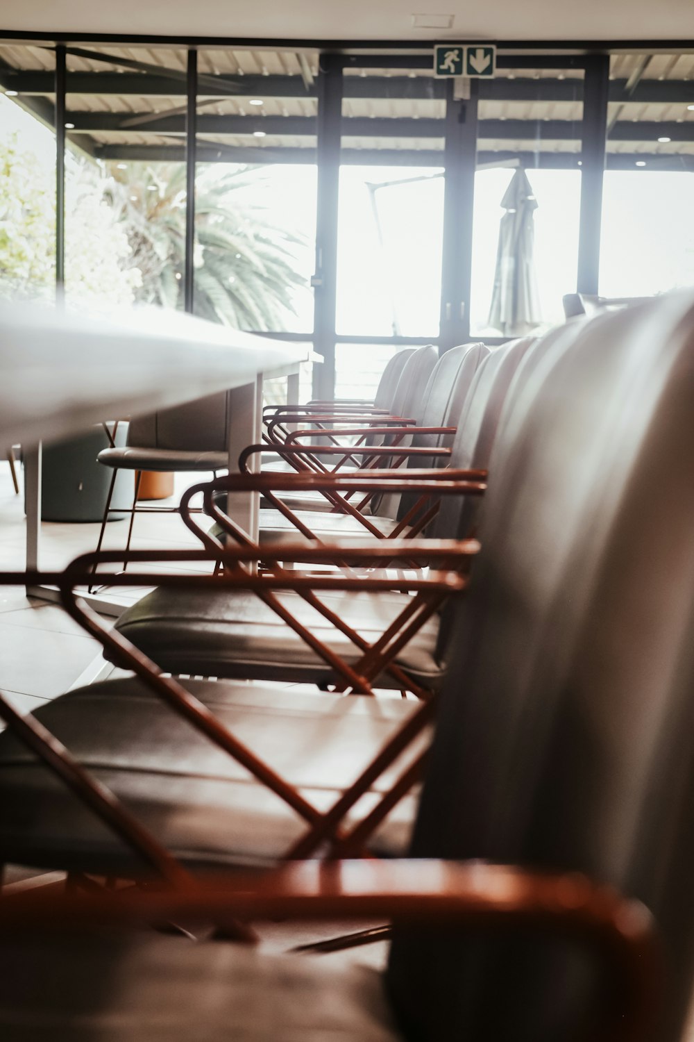 a group of tables and chairs in a room