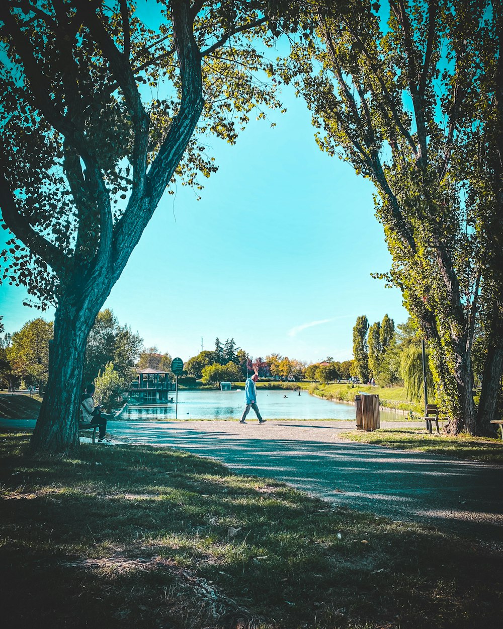 a person walking on a sidewalk