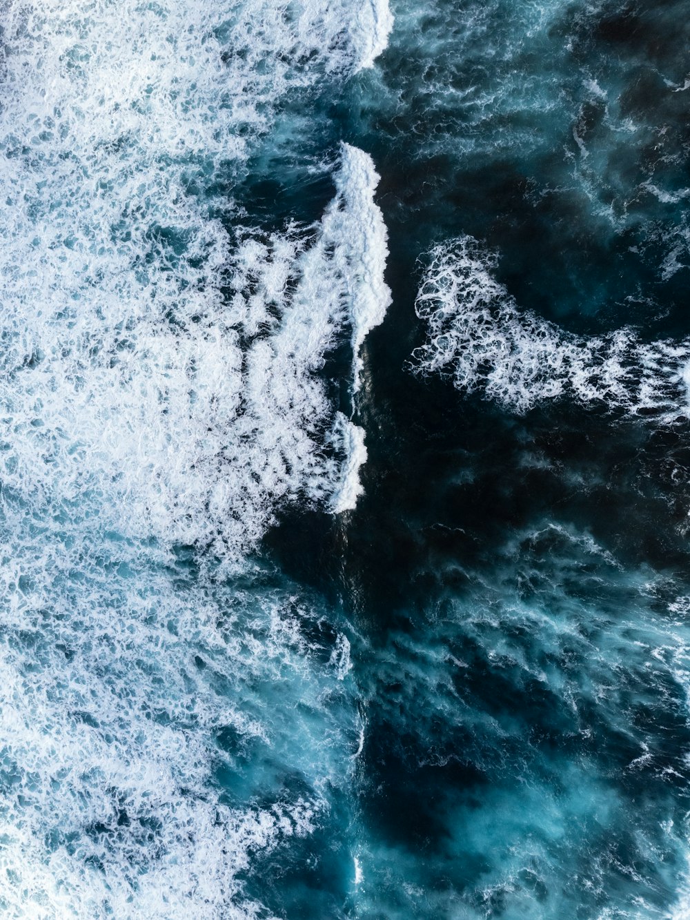 a wave crashing on a beach