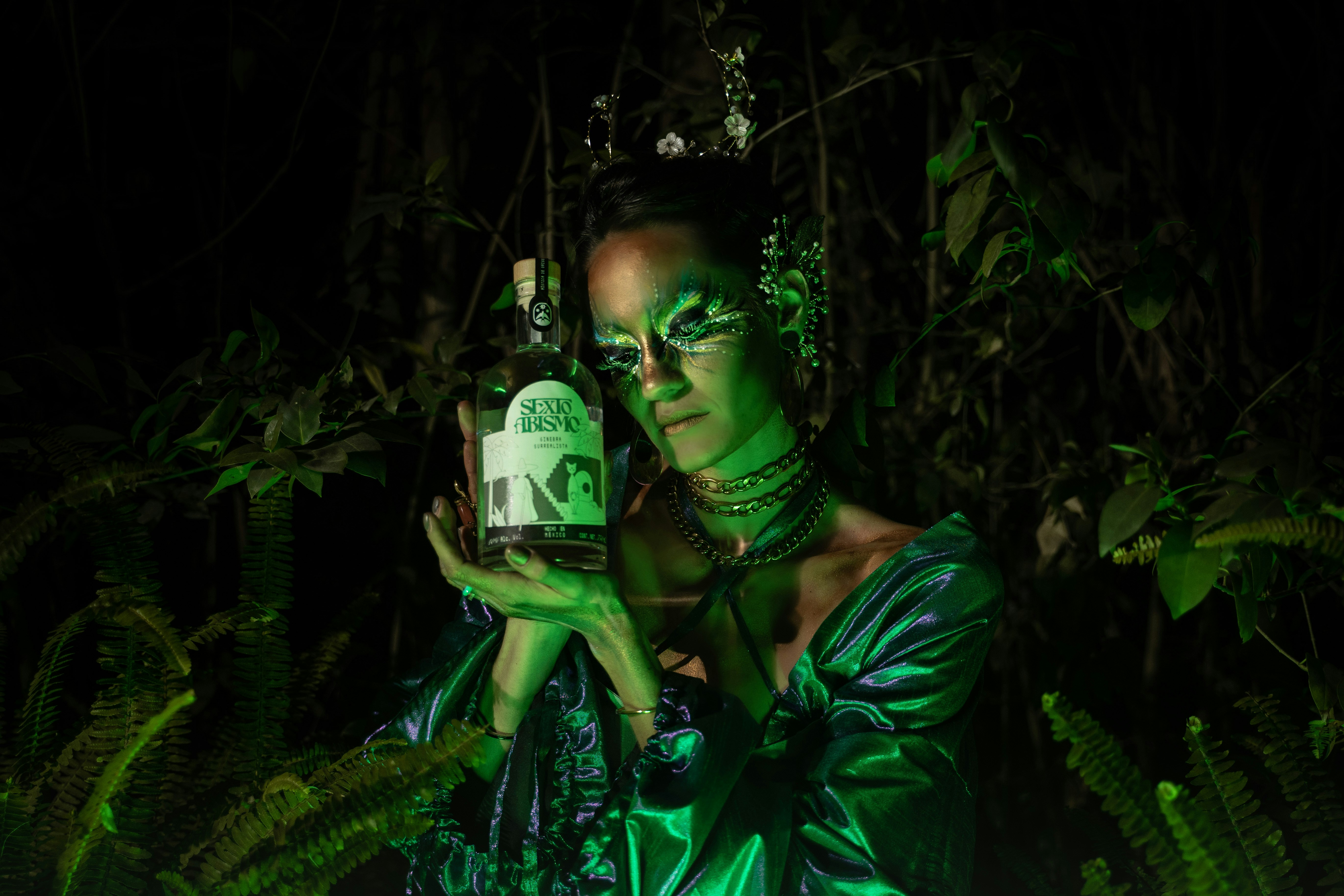 a person holding a bottle