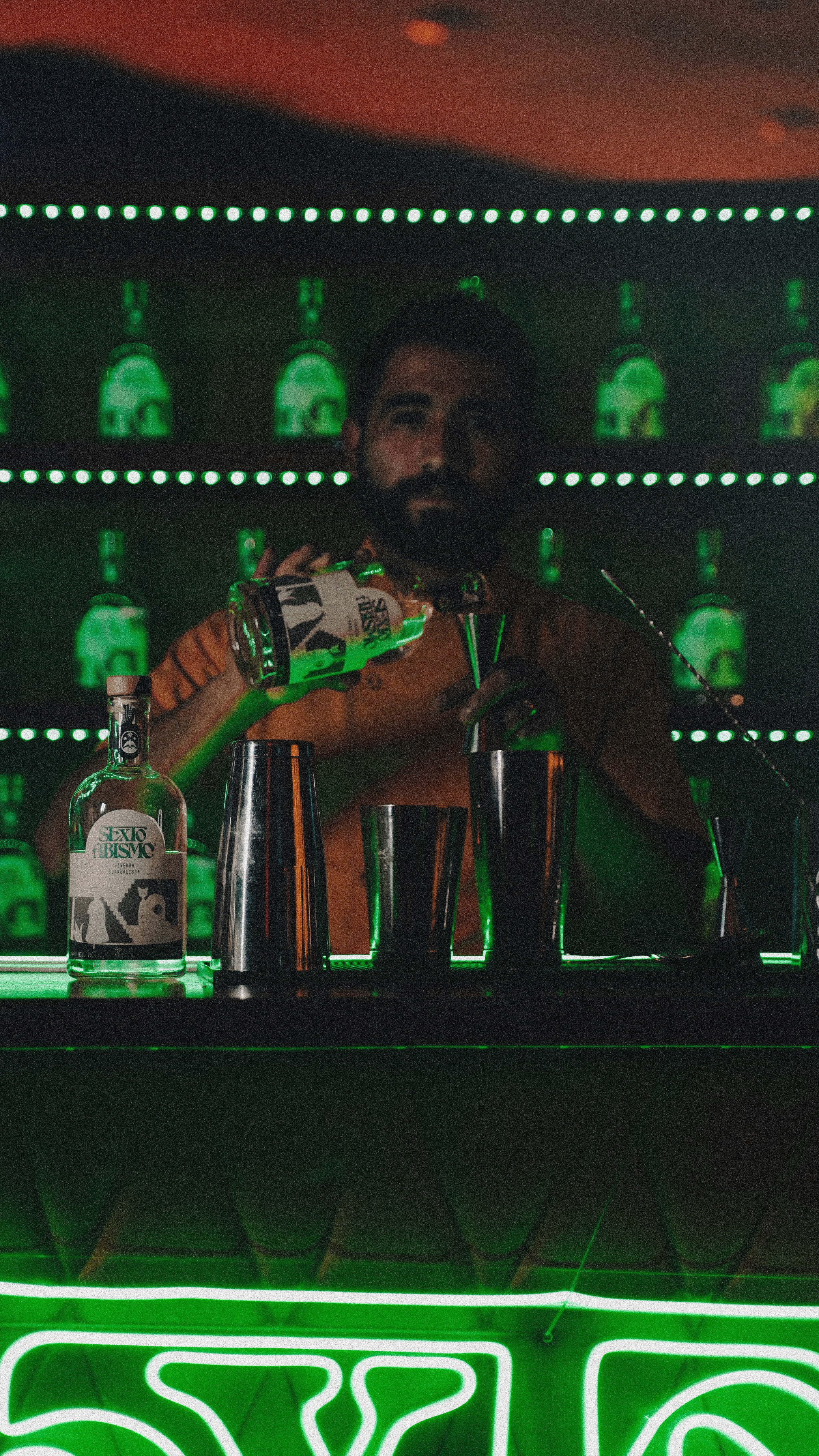 a man behind a bar