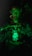 A person with shimmering green makeup and elaborate jewelry holds a bottle labeled 'Sexto Abrismo'. The scene is dimly lit with a green hue, giving it a mystical and otherworldly appearance.