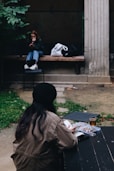 a person sitting on a bench