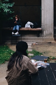 a person sitting on a bench