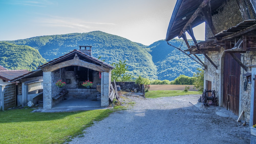 a small village with mountains in the background