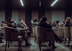 a group of people sitting at tables