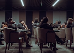 a group of people sitting at tables