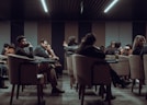 a group of people sitting at tables