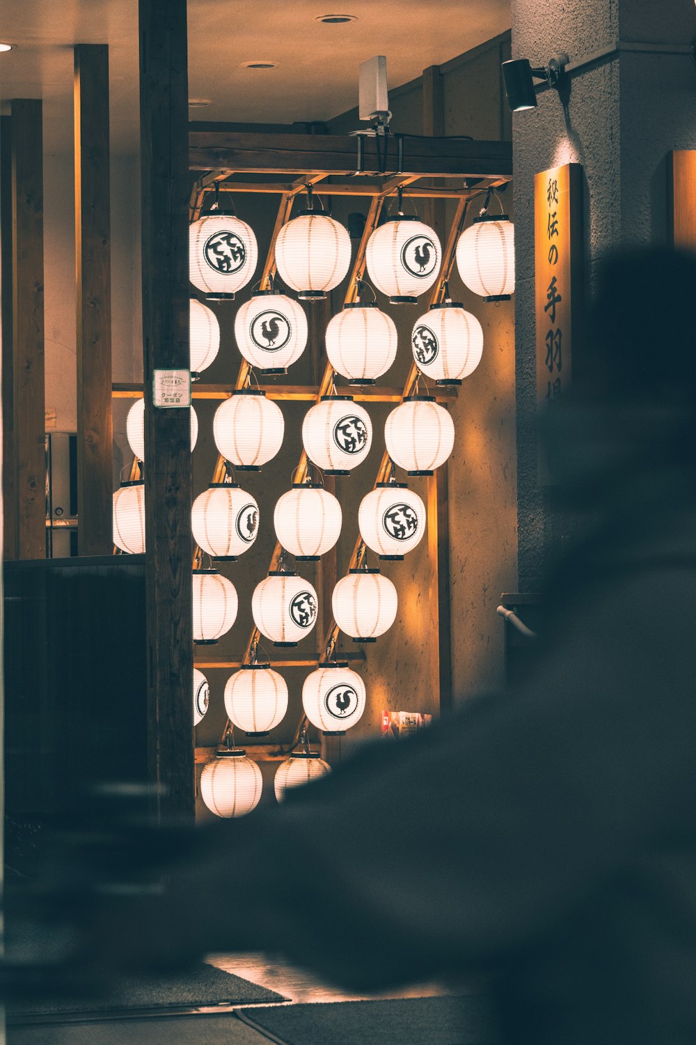 a large group of white and black lamps