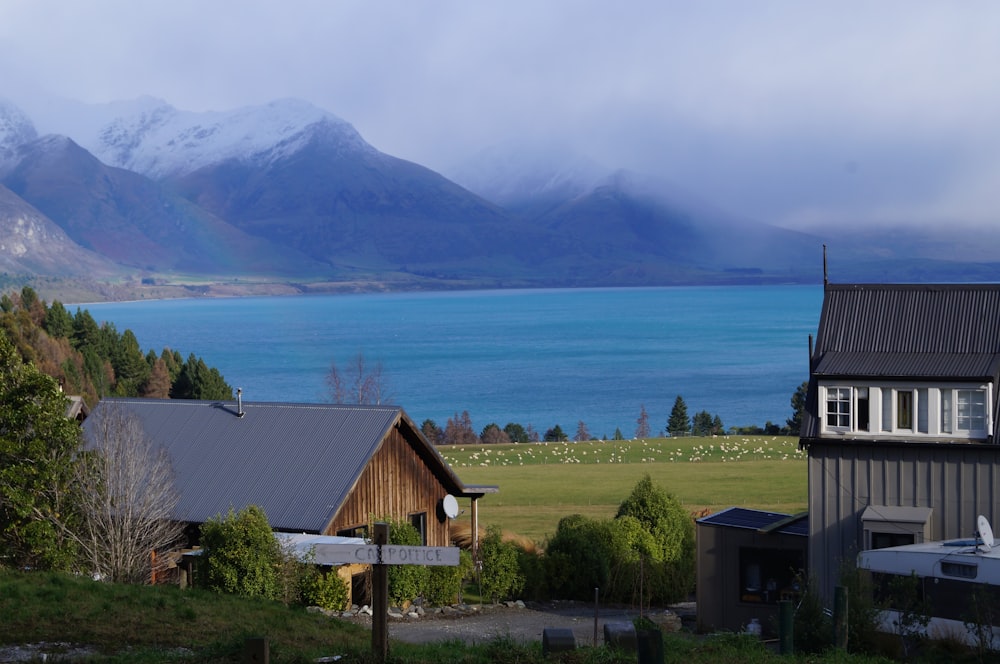 a house next to a body of water