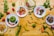 A vibrant plate of healthy food options displayed on a wooden table.