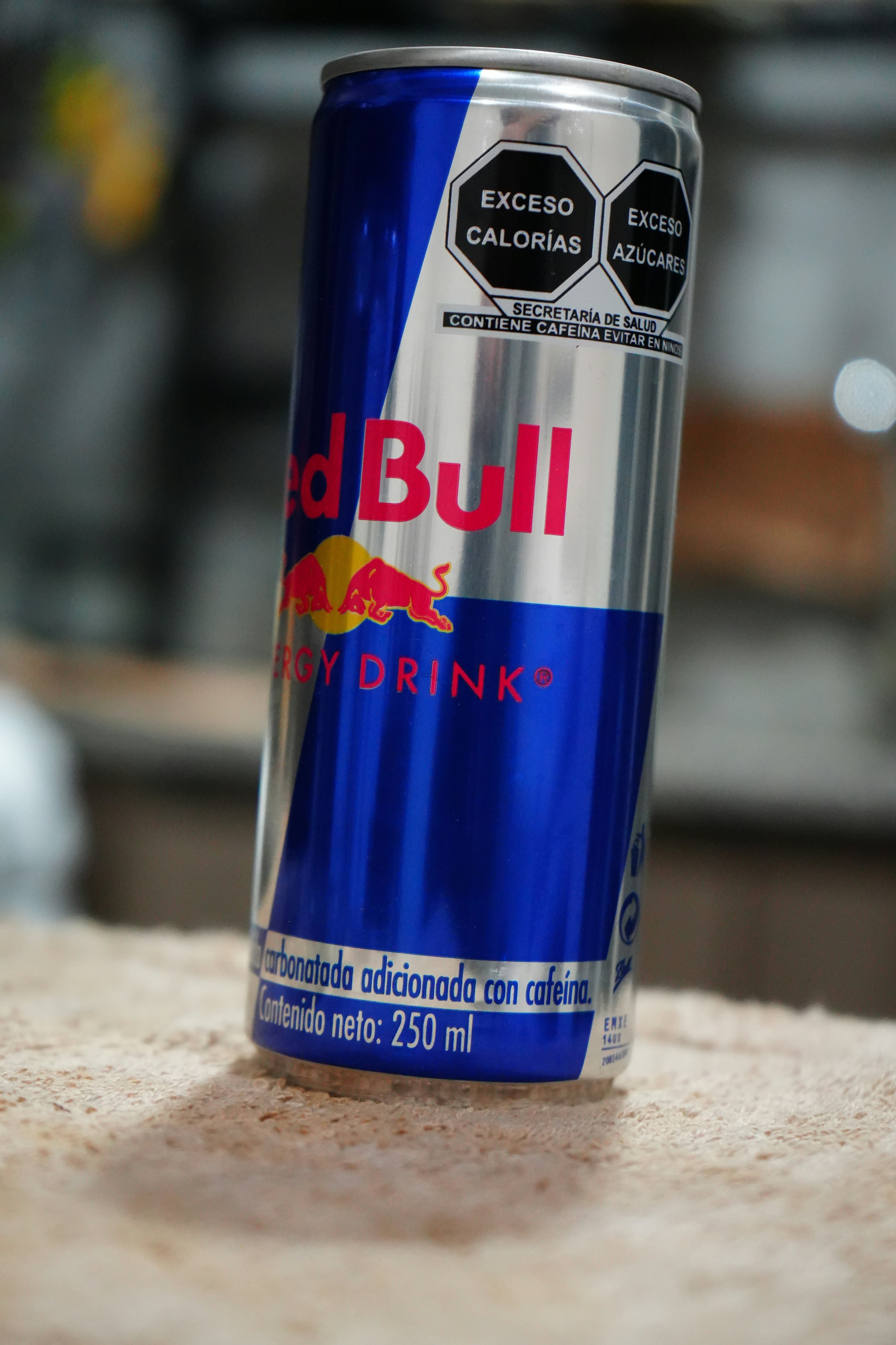 Silver and blue Red Bull energy drink can