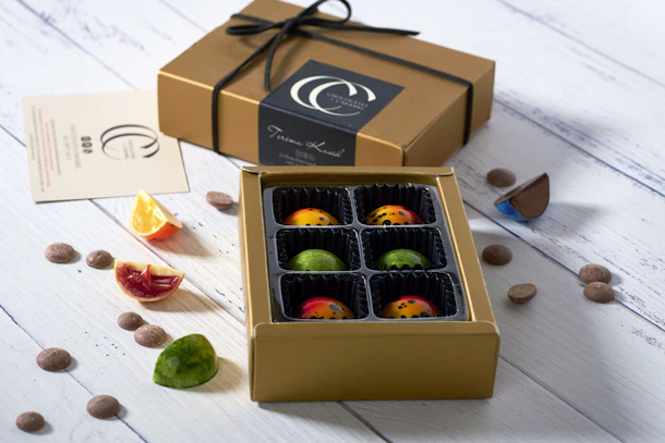 Close-up of a sleek custom sweet box with vibrant colors and sharp details.