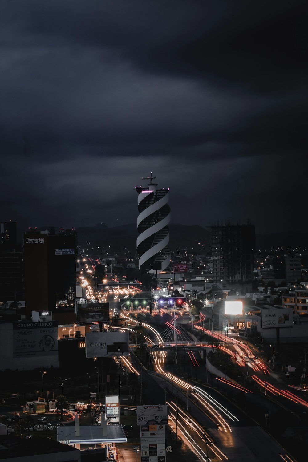 a large ship in a city at night