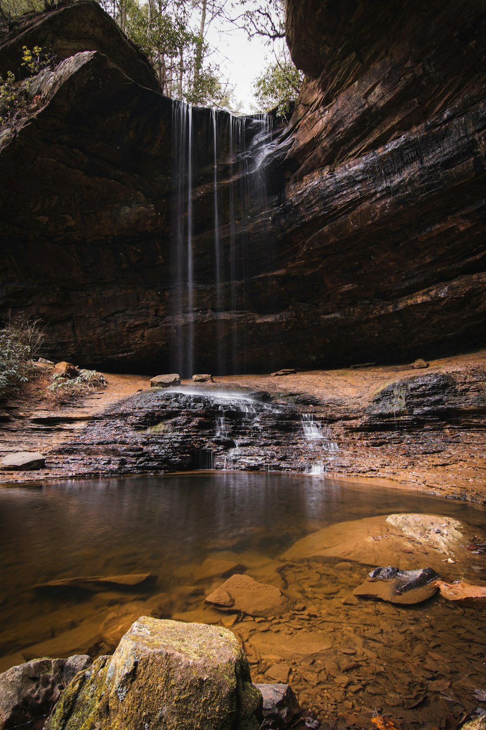 a waterfall in a rocky area