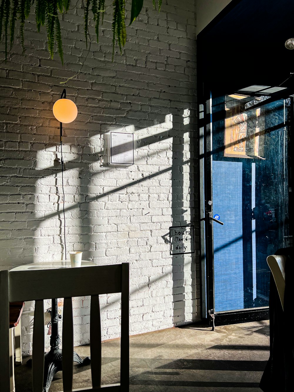 a table and chairs outside a building