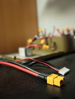 Electrical spare parts including wires and connectors, captured with sharp focus and natural lighting.