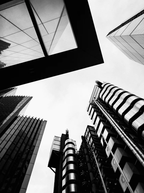 looking up at tall buildings
