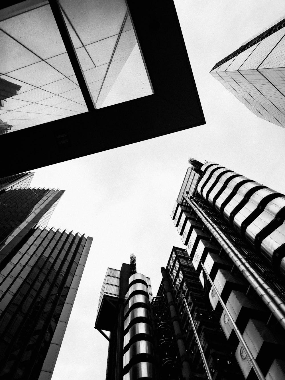 looking up at tall buildings